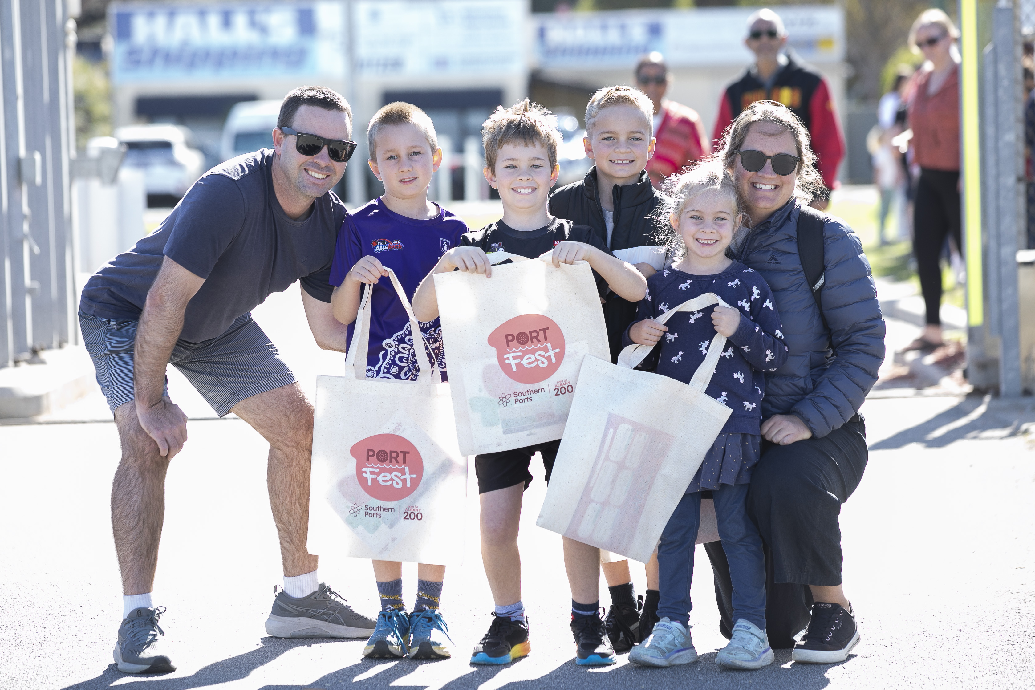 Family celebrating PortFest event