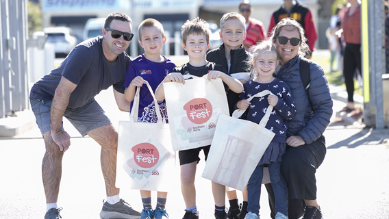 Family celebrating PortFest event