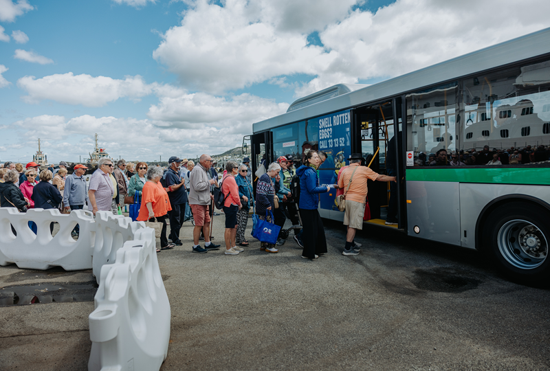 Cruise passengers boarding bus