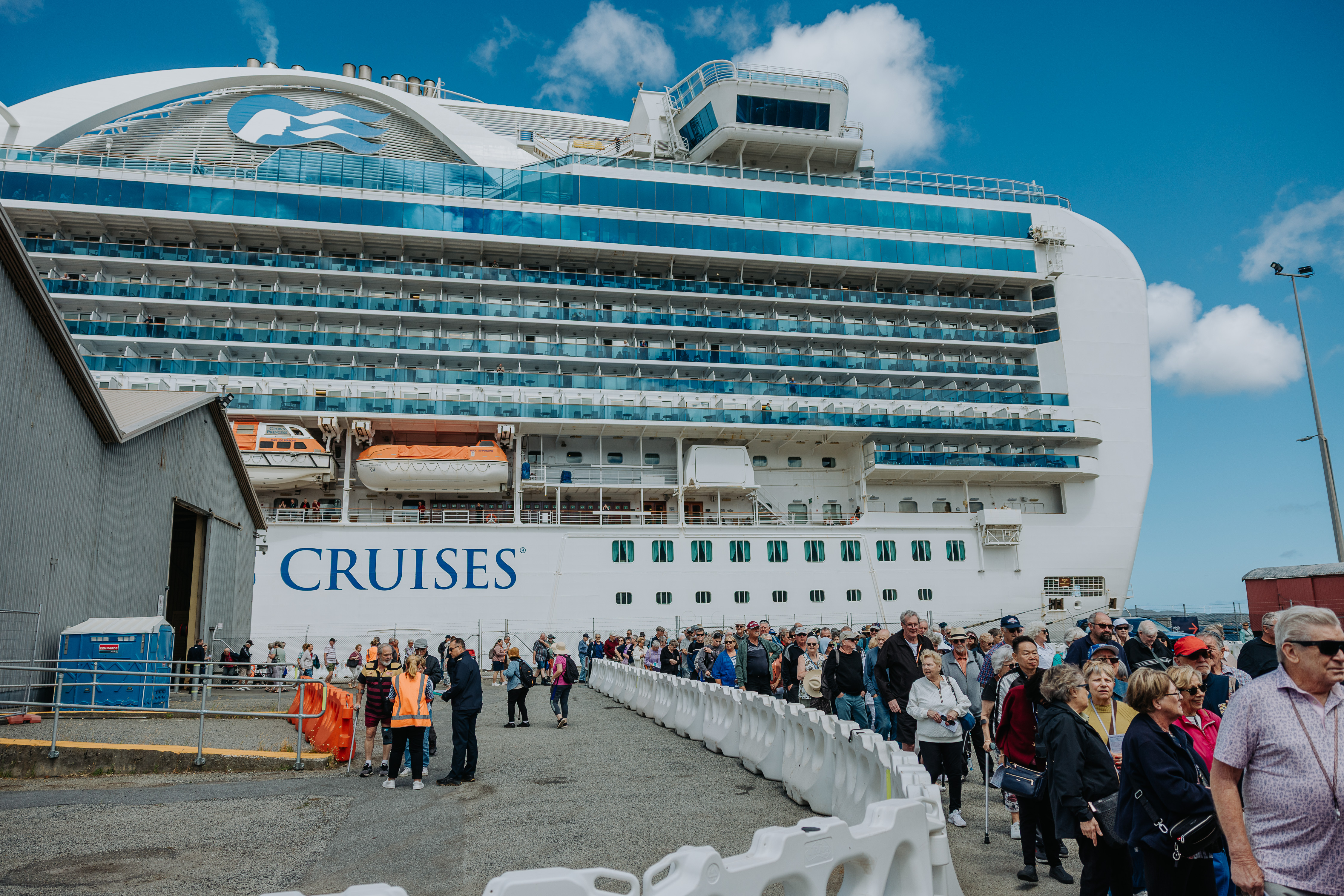 Cruise passengers awaiting transport