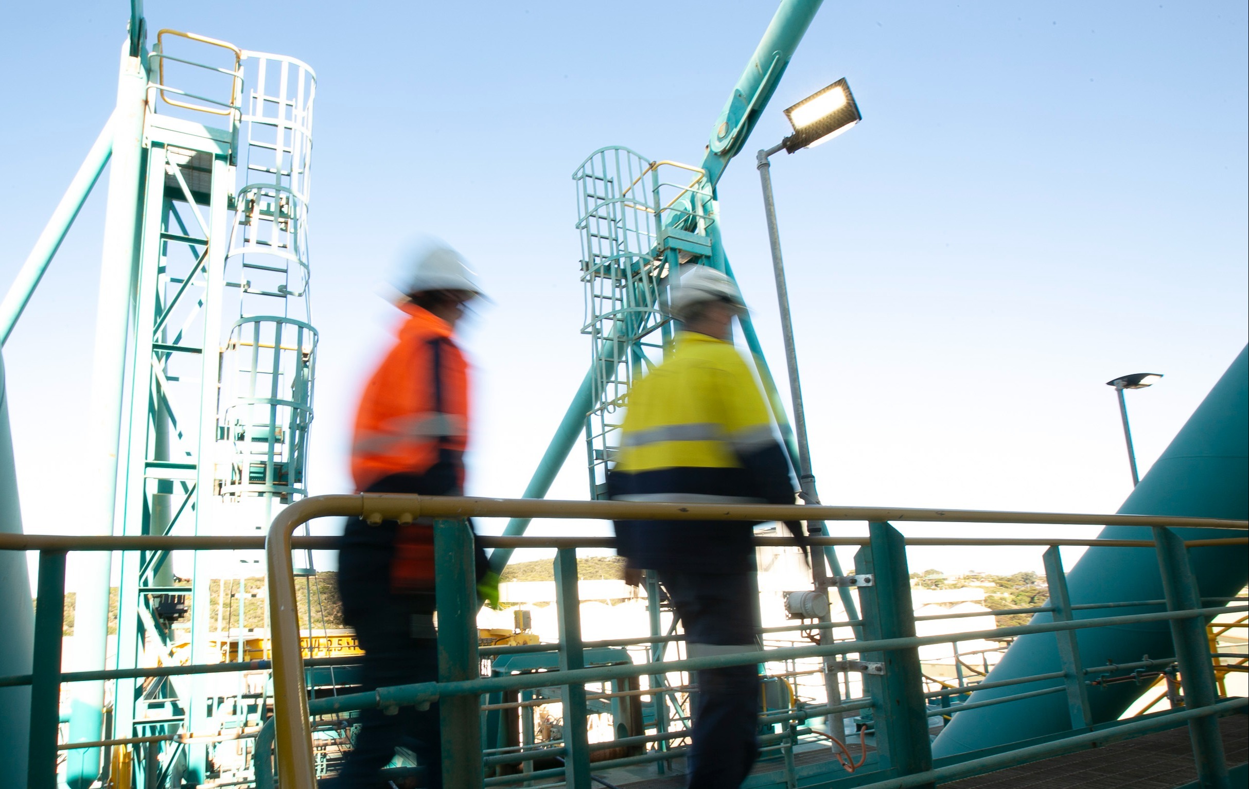 Contractor on container crane undertaking works