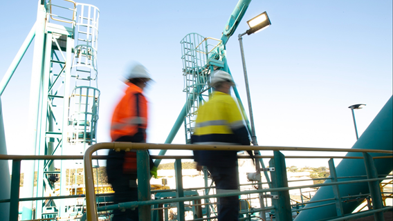 Contractor on container crane undertaking works