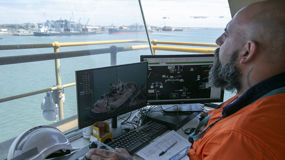 Southern Ports worker in control room of Berth 8 shiploader
