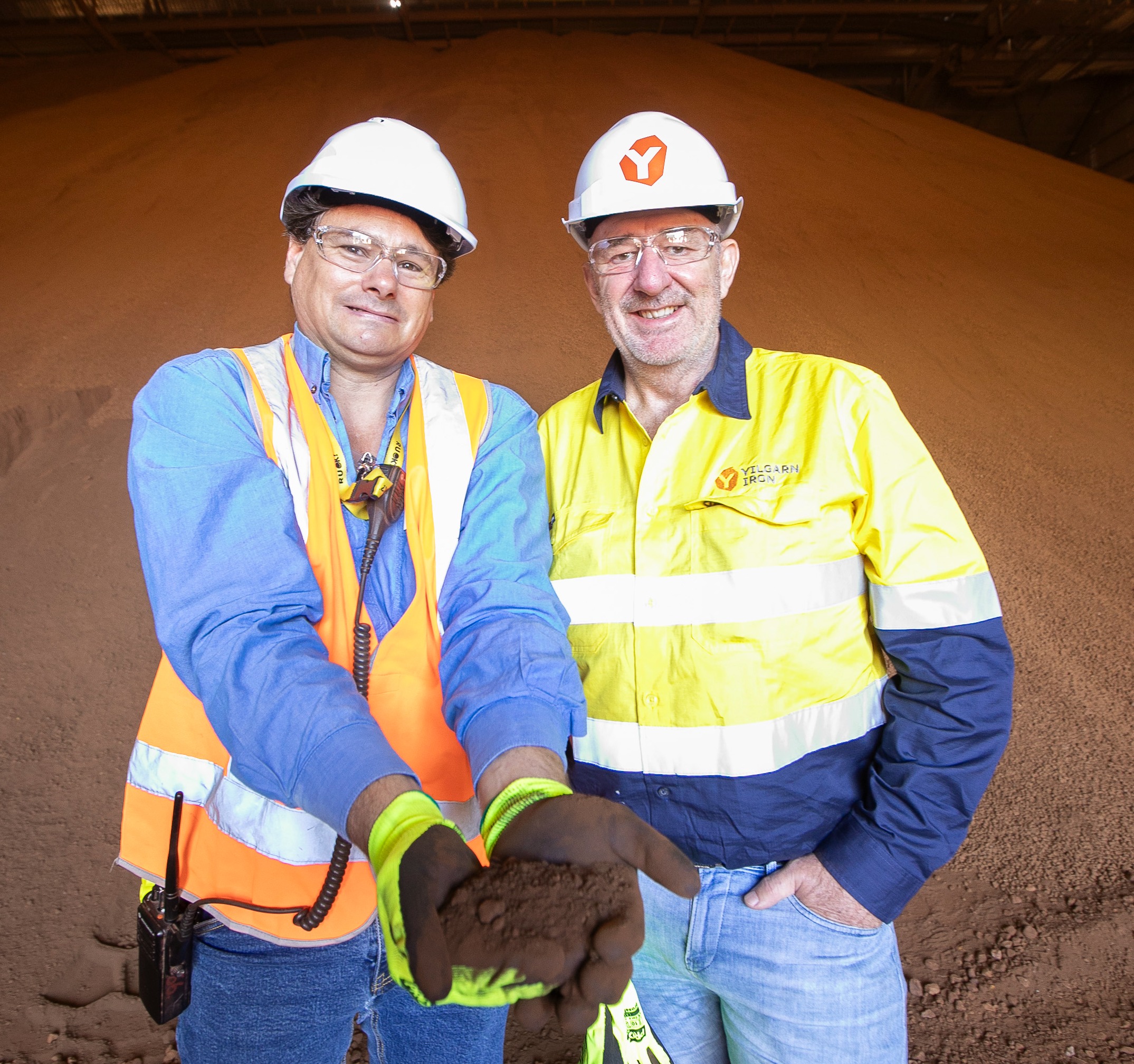 Yilgarn Iron and Southern Ports representatives with iron ore