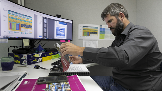 Southern Ports staff member reviewing documents