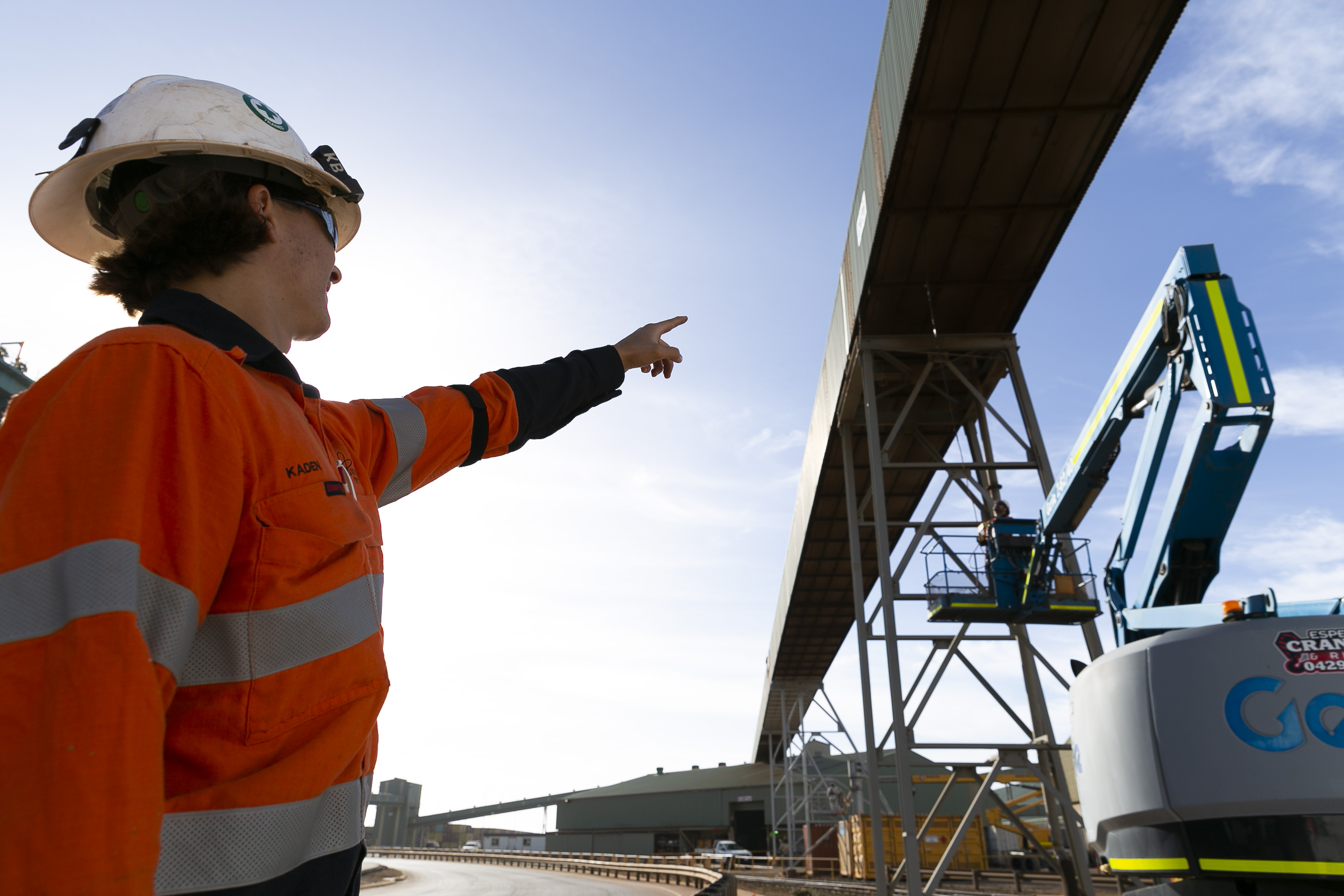 Worker on site with an elevated working platform