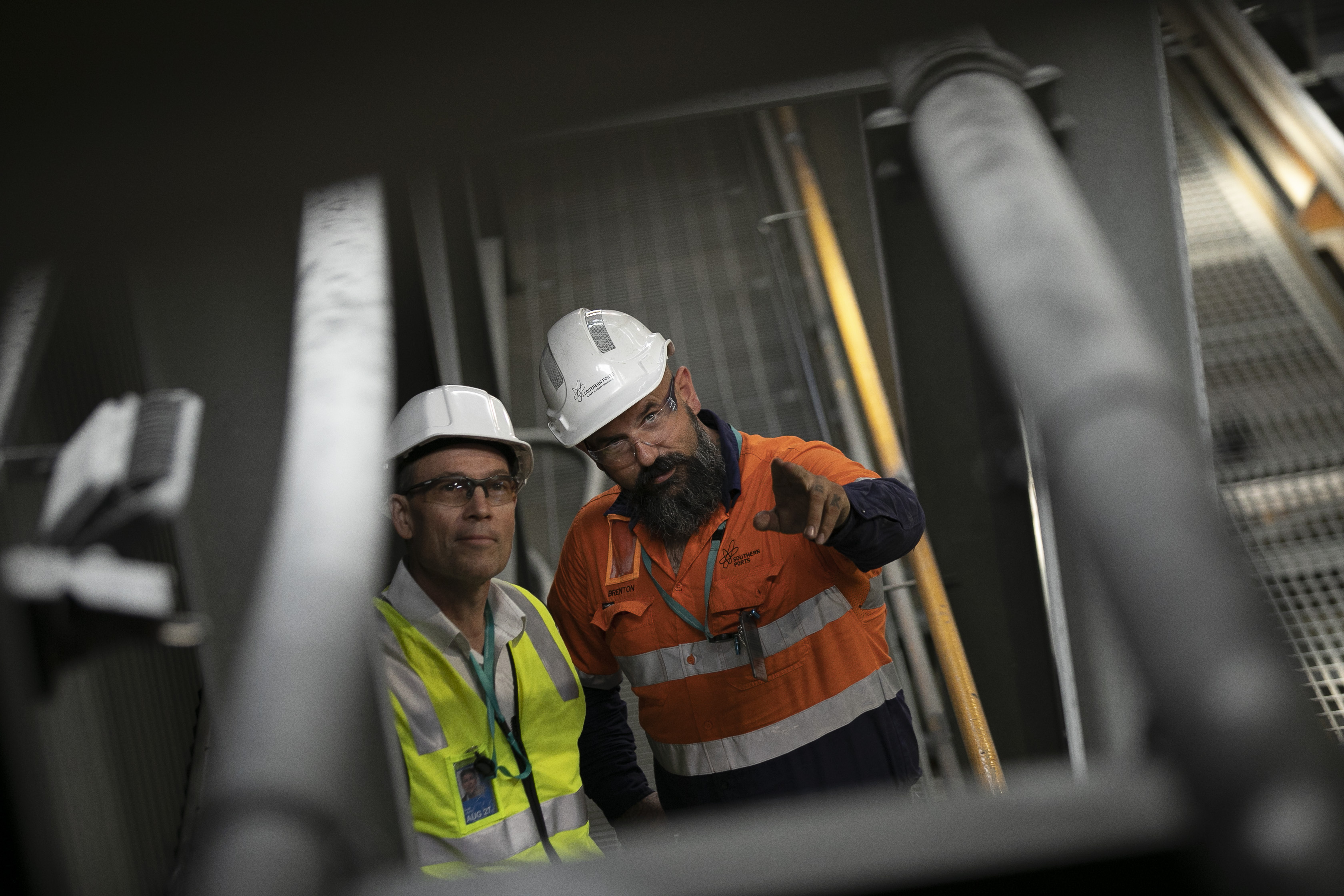 Southern Ports employees inspecting a conveyor