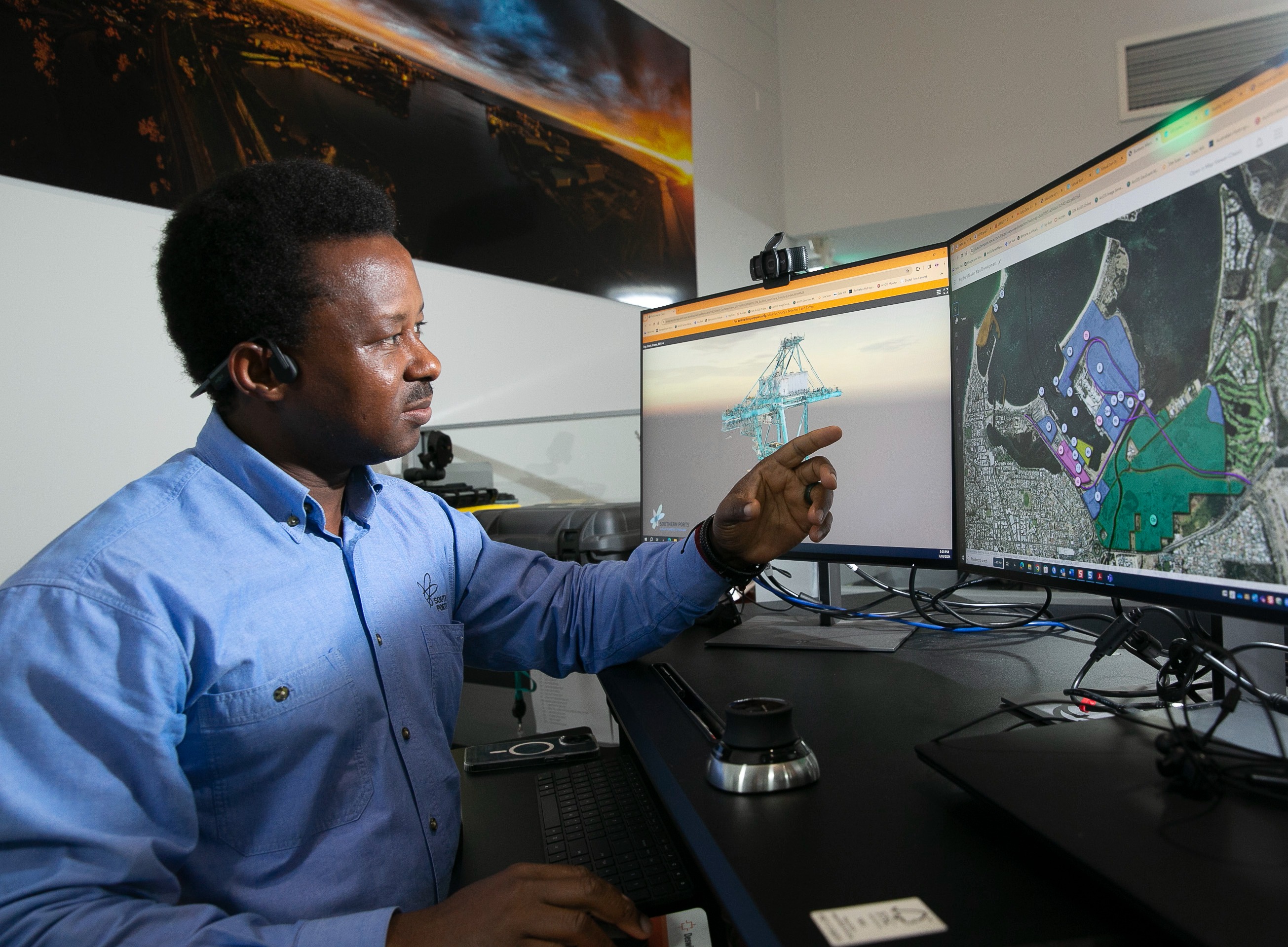Southern Ports staff member looking at interactive map
