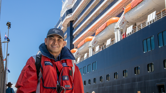 Pilot in front of cruise vessel
