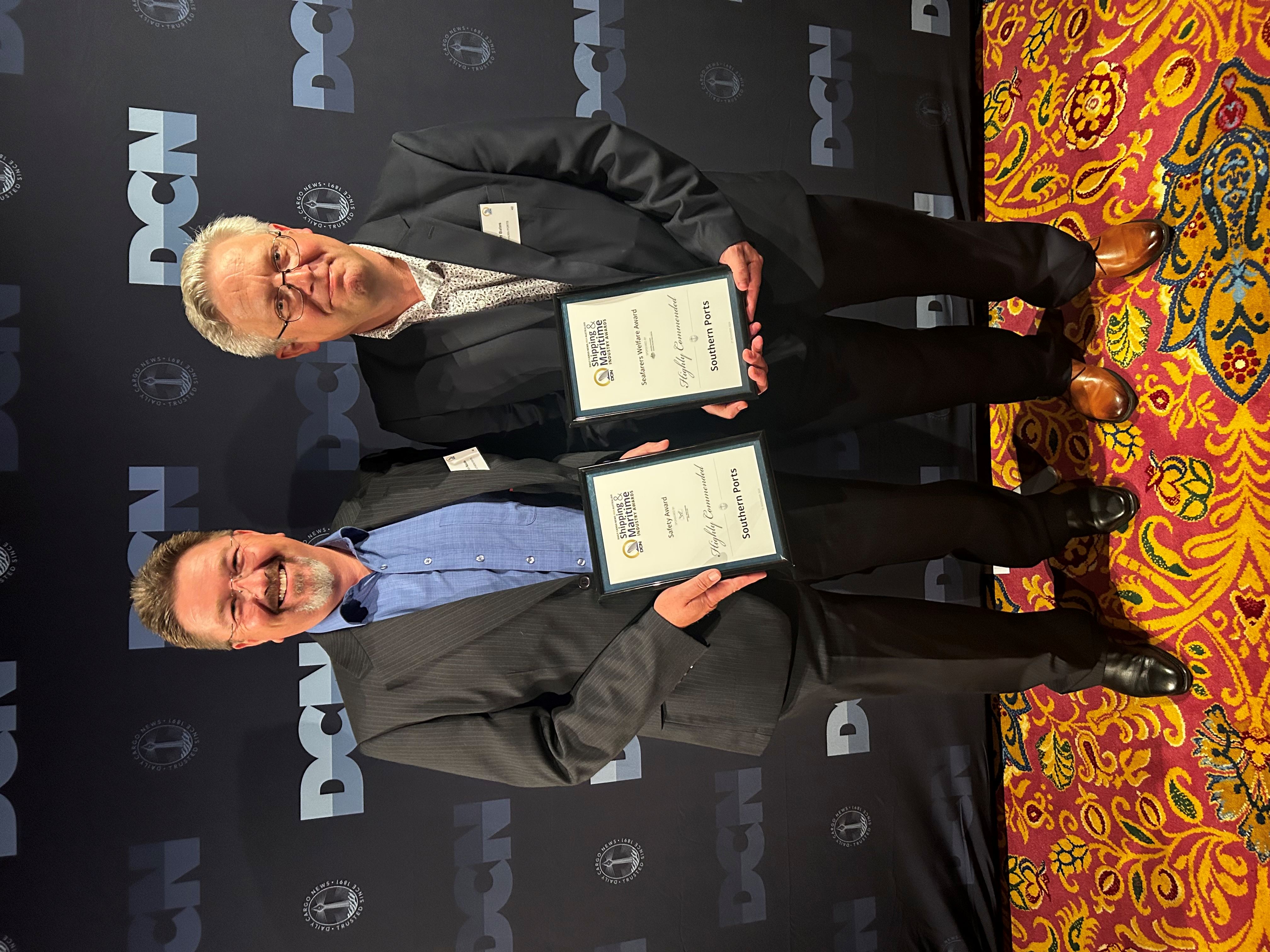 Two Southern Ports representatives holding highly commended awards